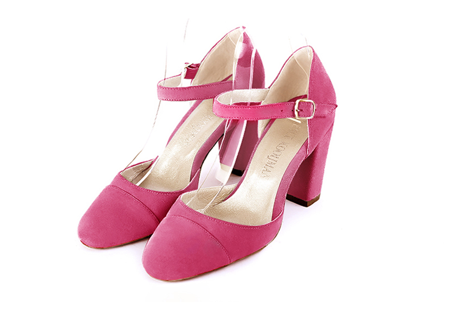 Women's fuchsia pink elegant closed-back heels, with an instep strap. Round toe. High block heels - Front view